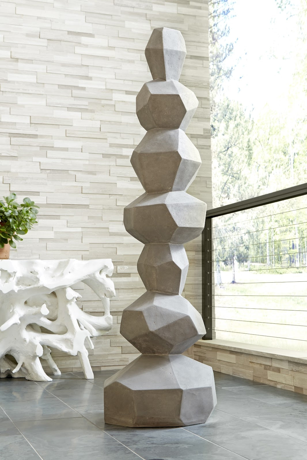 Faceted Rock Column Sculpture Gray