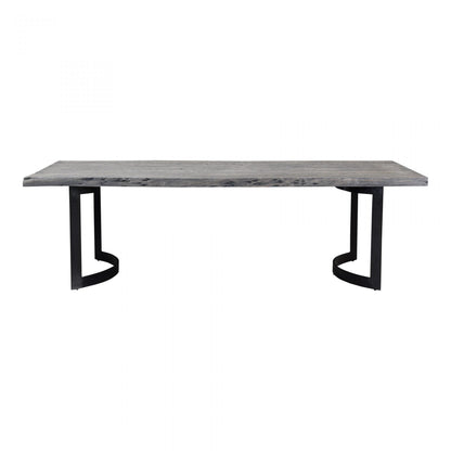 BENT SOLID SLAB DINING TABLE